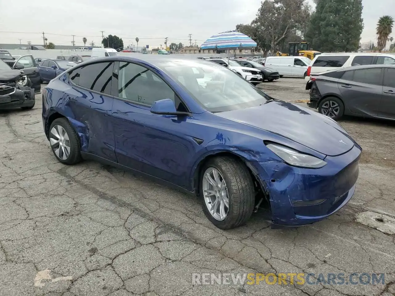4 Photograph of a damaged car 7SAYGDED5RF082102 TESLA MODEL Y 2024