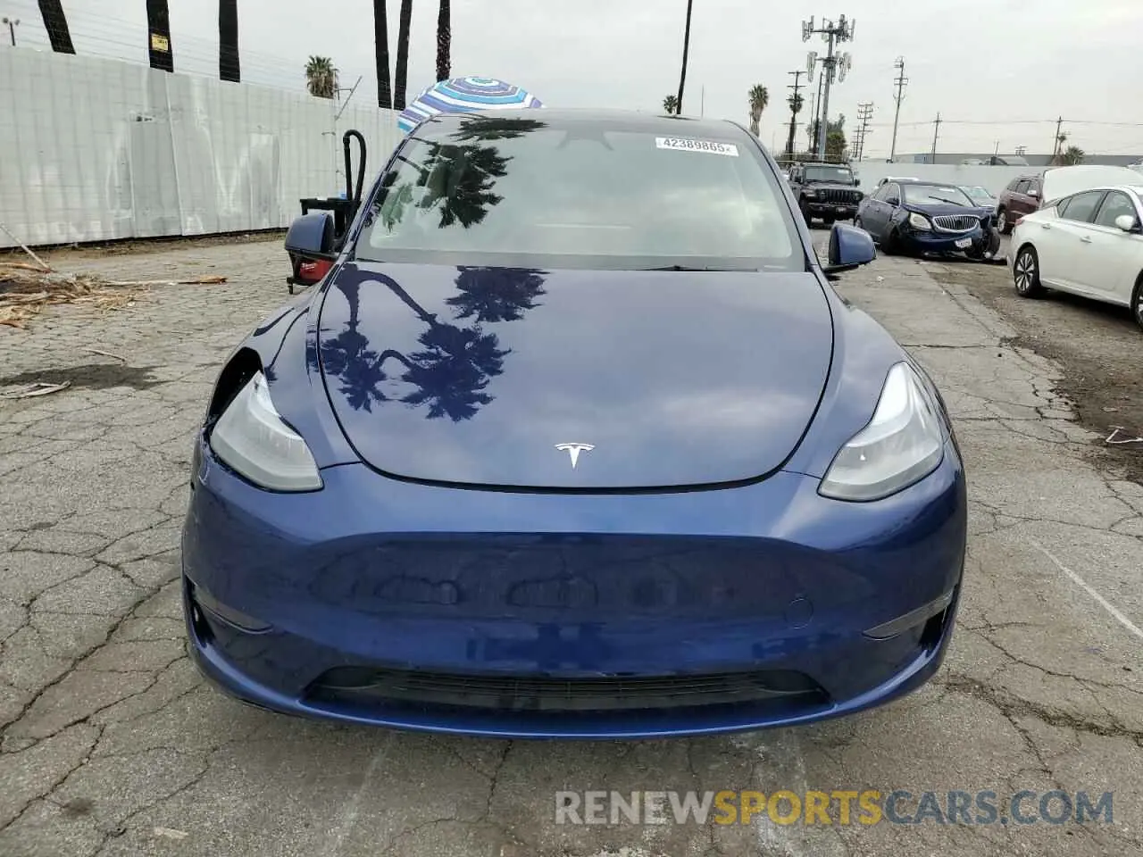 5 Photograph of a damaged car 7SAYGDED5RF082102 TESLA MODEL Y 2024