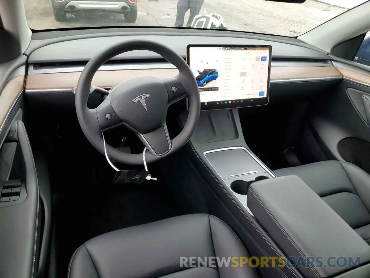 8 Photograph of a damaged car 7SAYGDED5RF082102 TESLA MODEL Y 2024