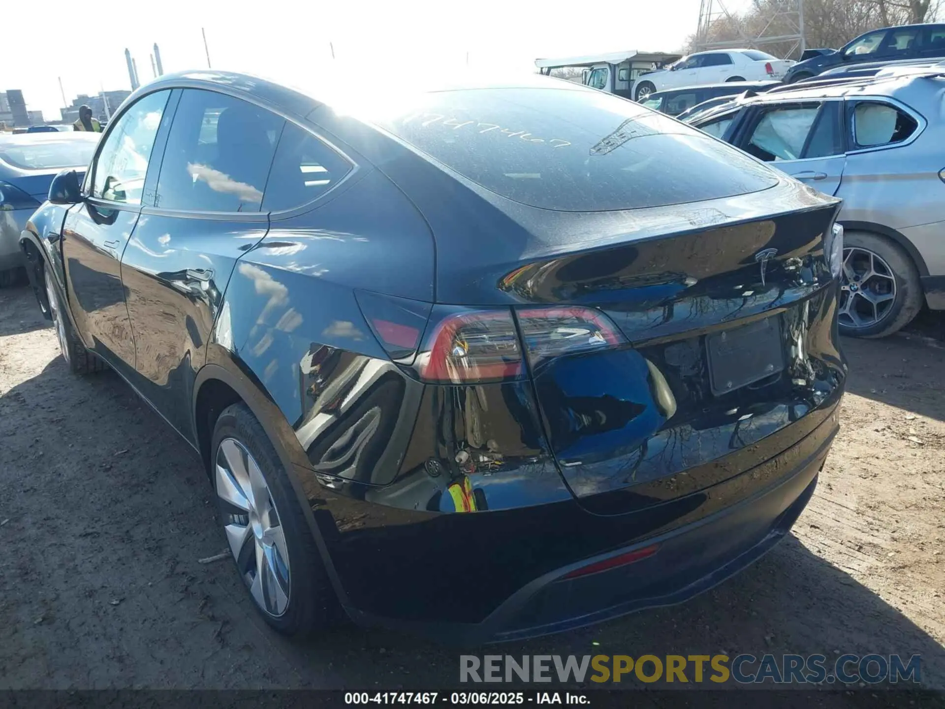 3 Photograph of a damaged car 7SAYGDED5RF093018 TESLA MODEL Y 2024