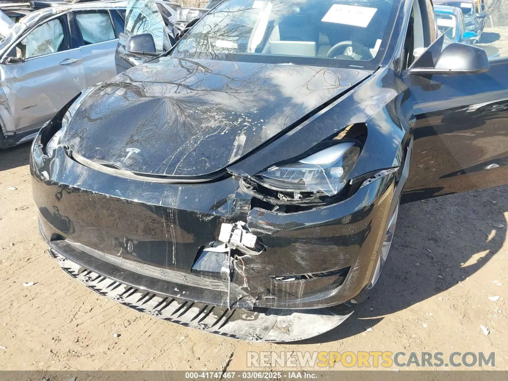 6 Photograph of a damaged car 7SAYGDED5RF093018 TESLA MODEL Y 2024