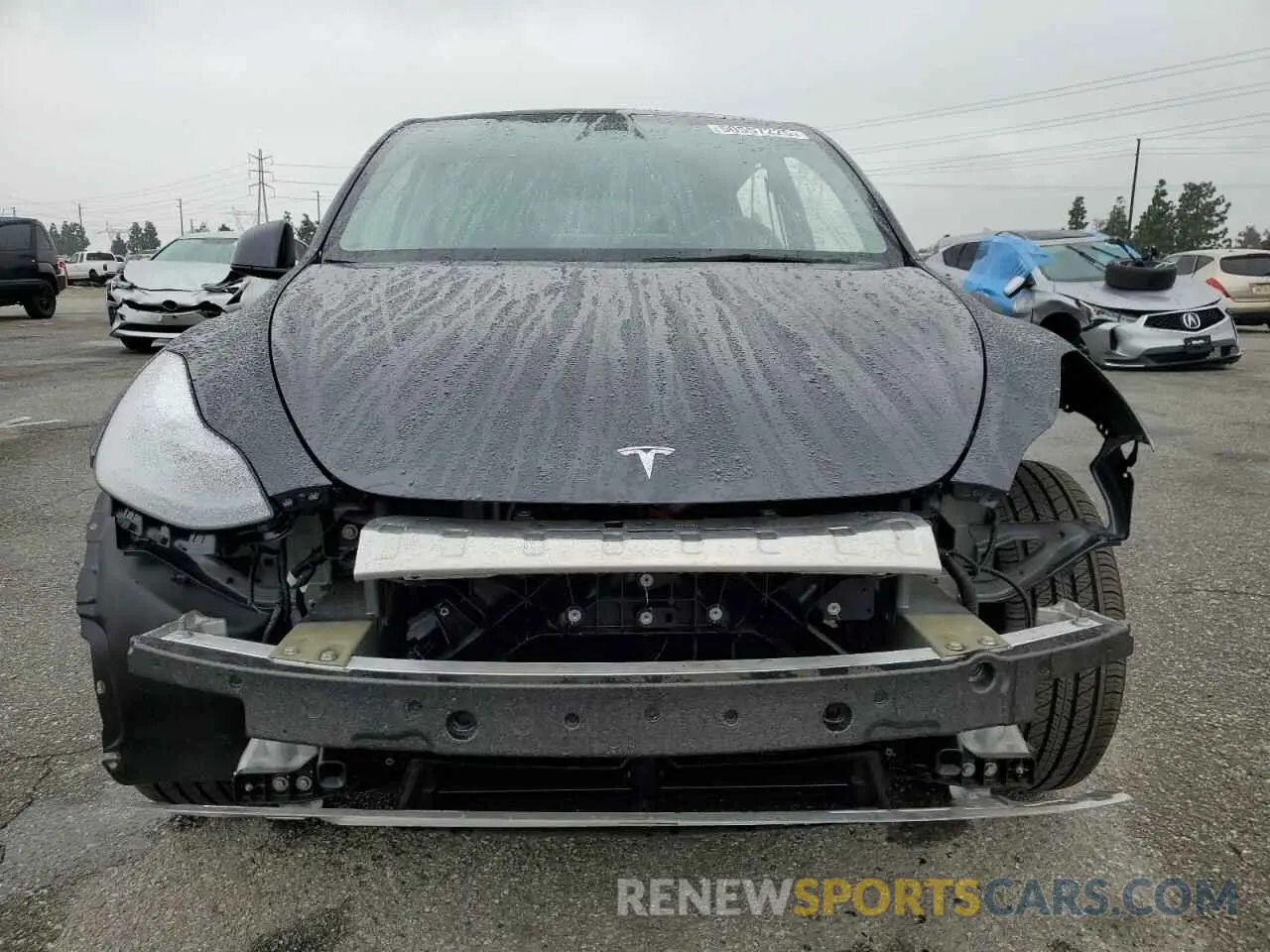 5 Photograph of a damaged car 7SAYGDED5RF093410 TESLA MODEL Y 2024