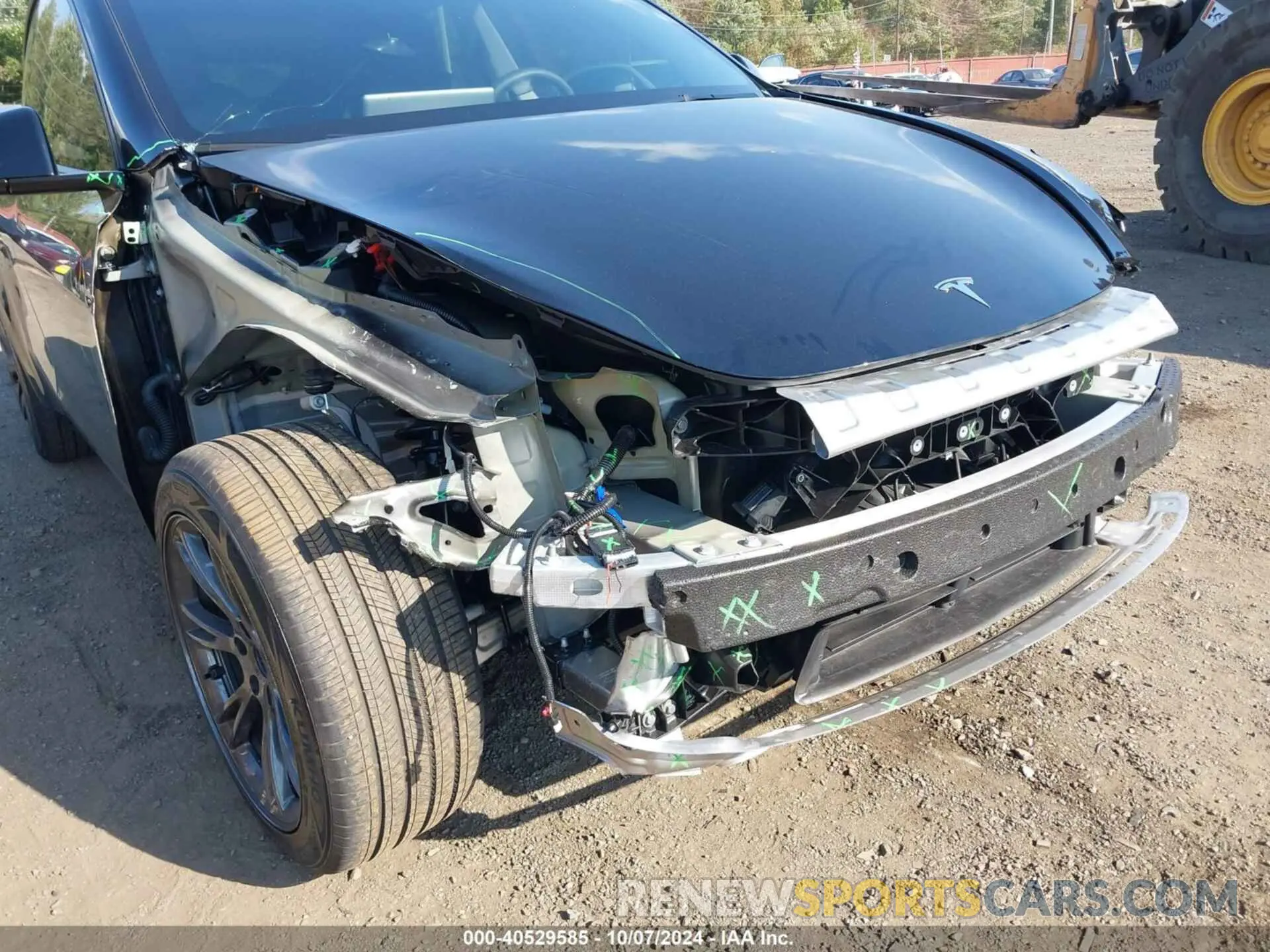 6 Photograph of a damaged car 7SAYGDED5RF130214 TESLA MODEL Y 2024