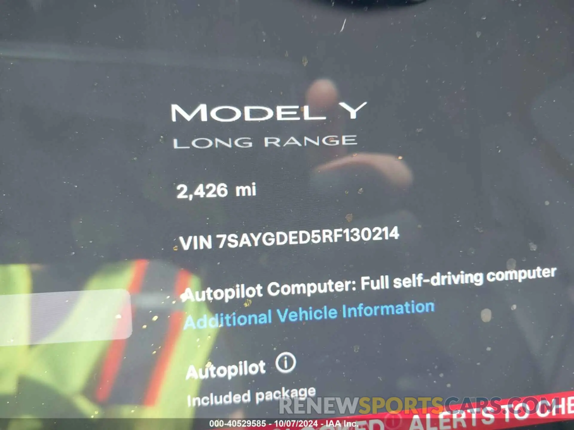 7 Photograph of a damaged car 7SAYGDED5RF130214 TESLA MODEL Y 2024
