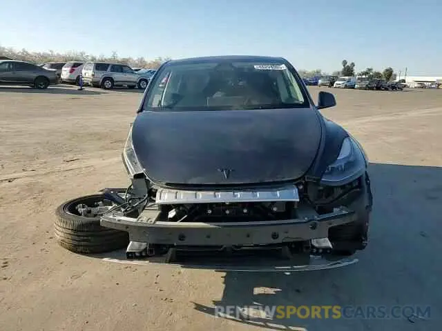 11 Photograph of a damaged car 7SAYGDED5RF185245 TESLA MODEL Y 2024