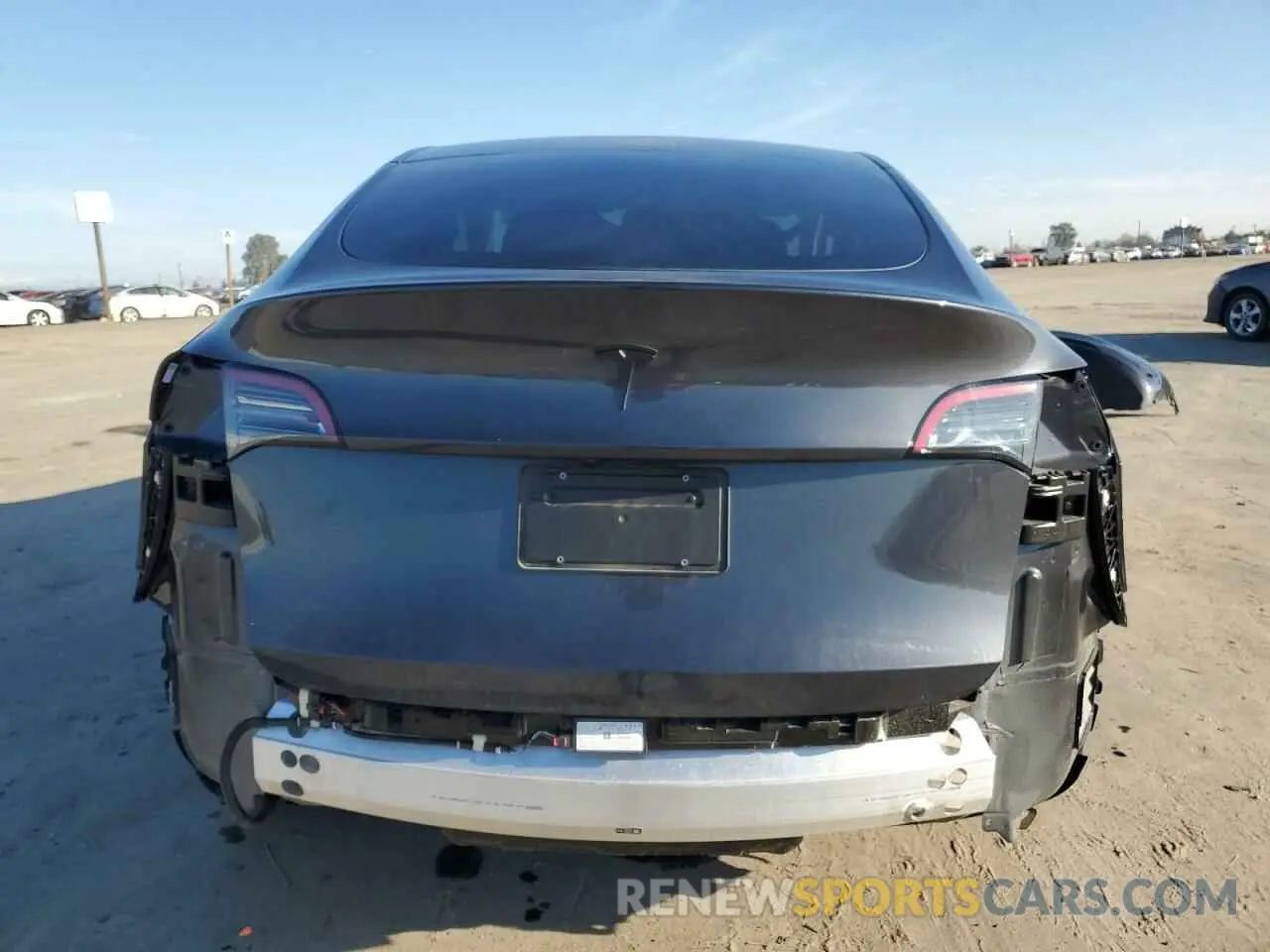 6 Photograph of a damaged car 7SAYGDED5RF185245 TESLA MODEL Y 2024