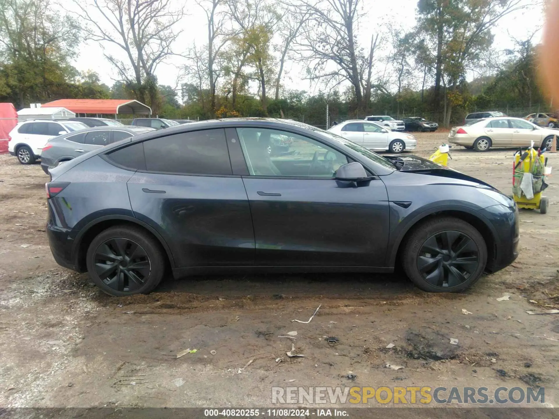 12 Photograph of a damaged car 7SAYGDED6RA310492 TESLA MODEL Y 2024
