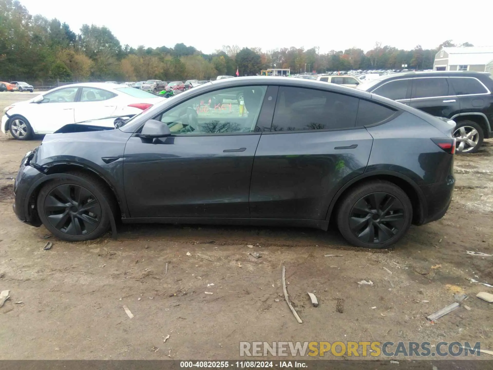 13 Photograph of a damaged car 7SAYGDED6RA310492 TESLA MODEL Y 2024