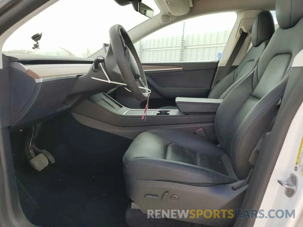 7 Photograph of a damaged car 7SAYGDED6RF044376 TESLA MODEL Y 2024