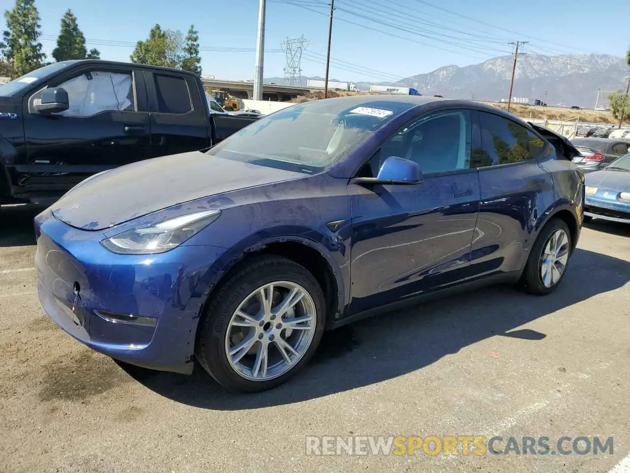 1 Photograph of a damaged car 7SAYGDED6RF083842 TESLA MODEL Y 2024