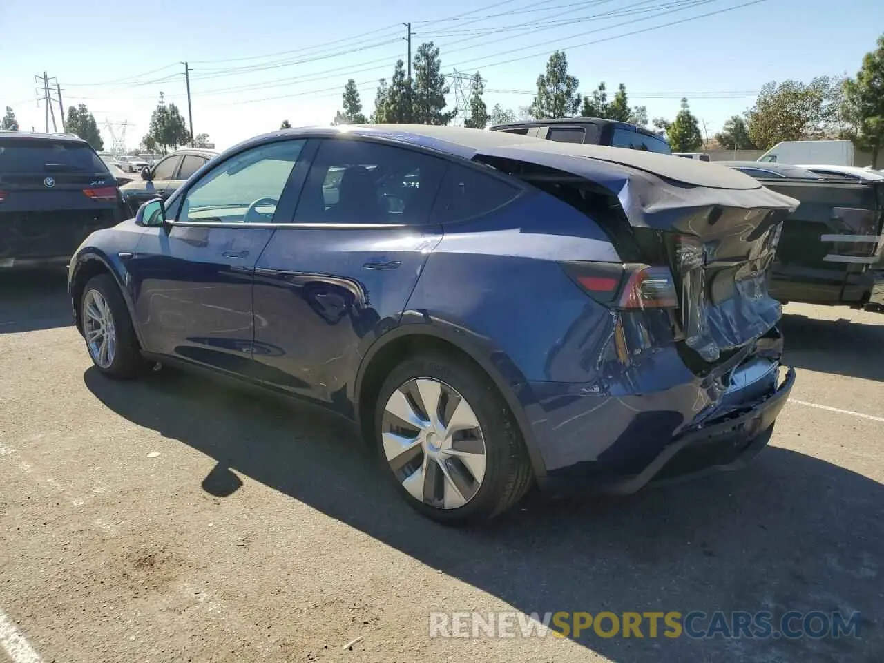 2 Photograph of a damaged car 7SAYGDED6RF083842 TESLA MODEL Y 2024