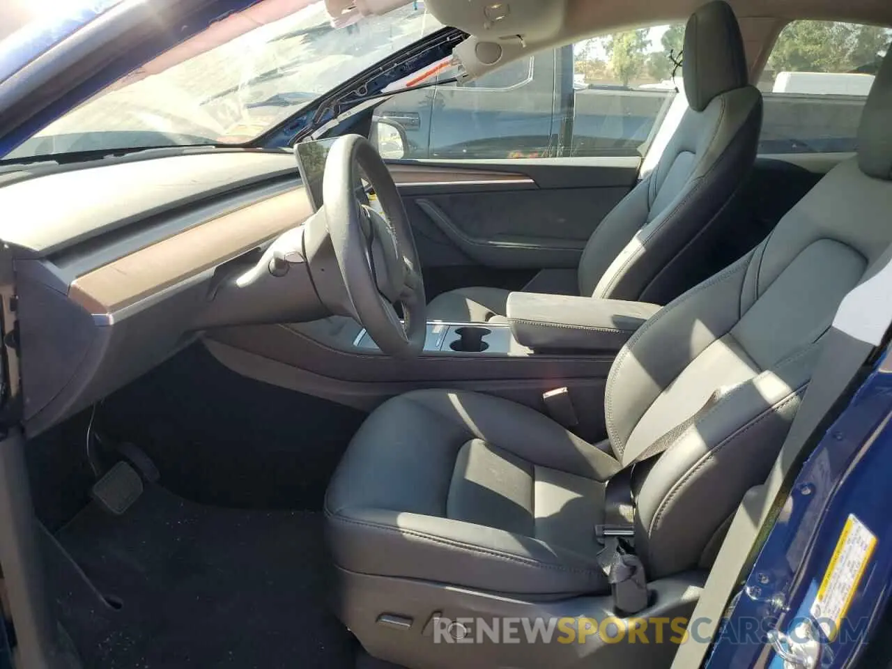 7 Photograph of a damaged car 7SAYGDED6RF083842 TESLA MODEL Y 2024