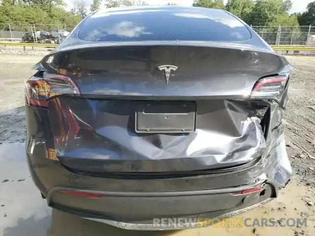 6 Photograph of a damaged car 7SAYGDED6RF091911 TESLA MODEL Y 2024