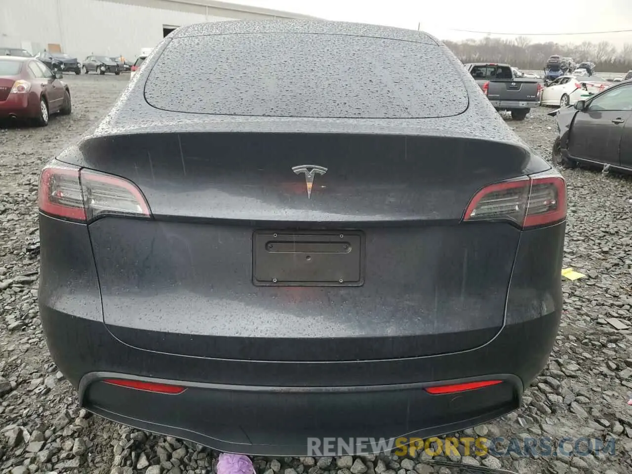 6 Photograph of a damaged car 7SAYGDED6RF093531 TESLA MODEL Y 2024