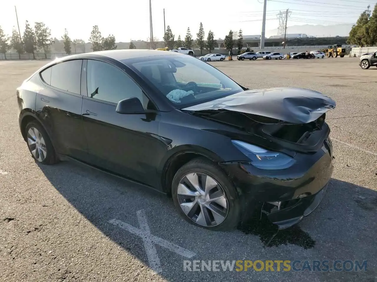 4 Photograph of a damaged car 7SAYGDED6RF097093 TESLA MODEL Y 2024