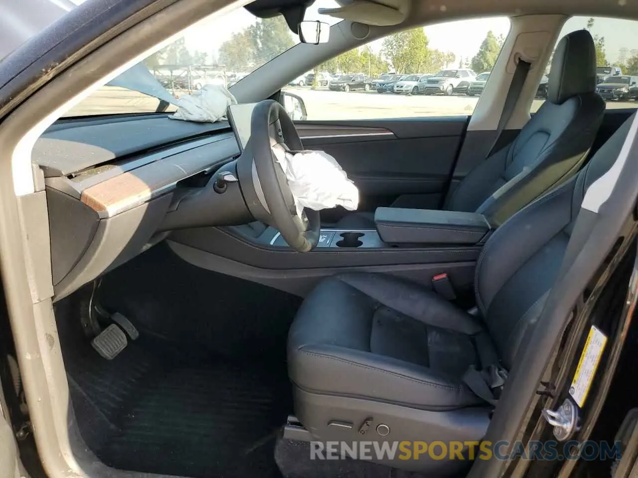 7 Photograph of a damaged car 7SAYGDED6RF097093 TESLA MODEL Y 2024