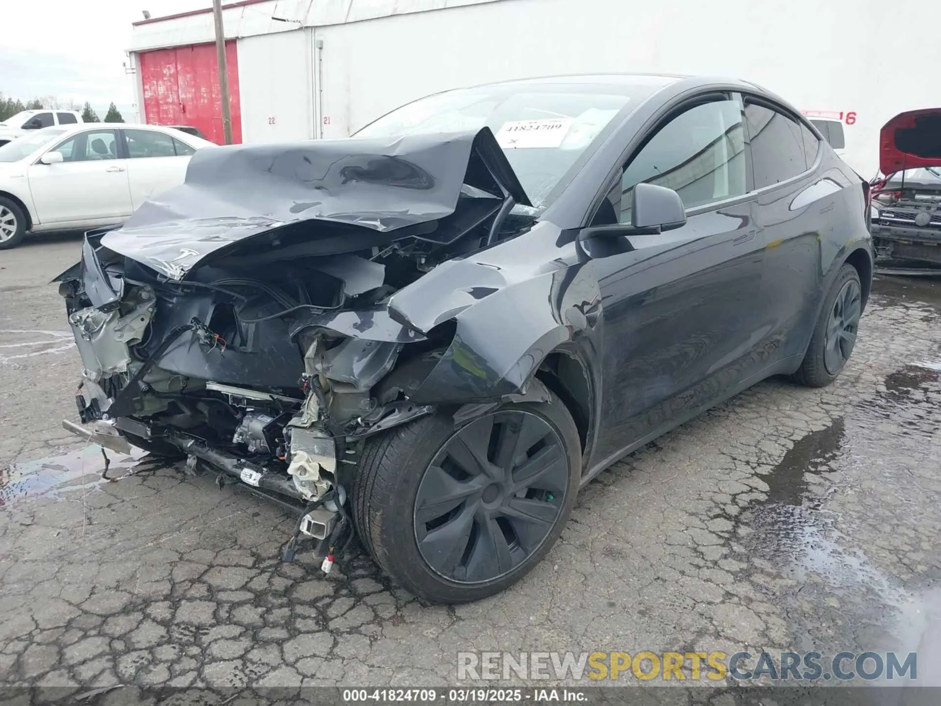 2 Photograph of a damaged car 7SAYGDED6RF102745 TESLA MODEL Y 2024