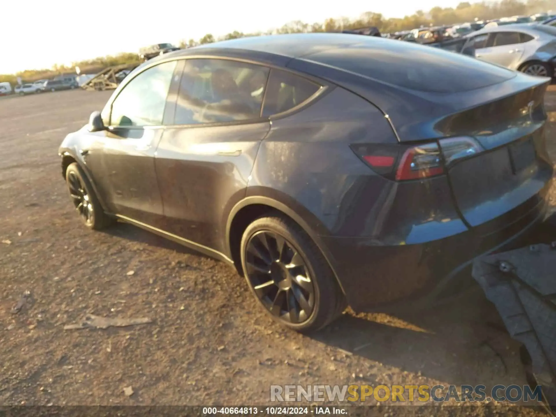 3 Photograph of a damaged car 7SAYGDED6RF105175 TESLA MODEL Y 2024