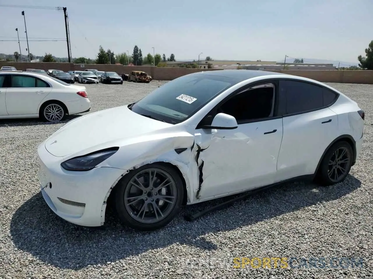 1 Photograph of a damaged car 7SAYGDED6RF107654 TESLA MODEL Y 2024