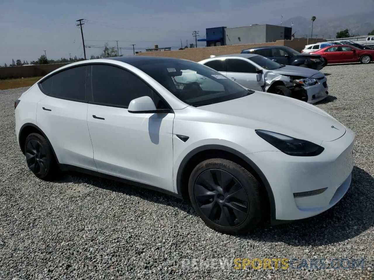 4 Photograph of a damaged car 7SAYGDED6RF107654 TESLA MODEL Y 2024