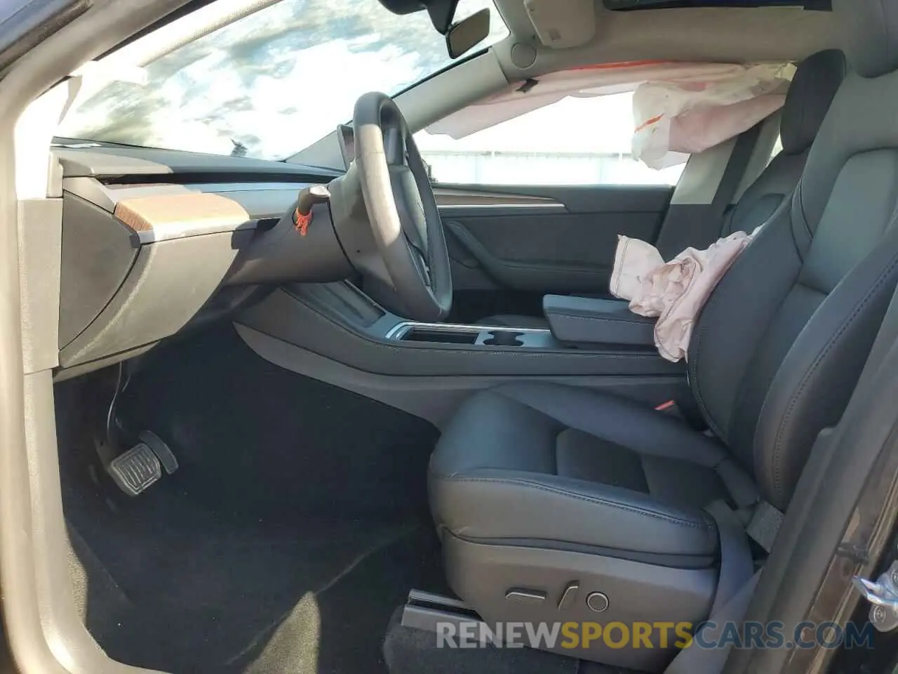 7 Photograph of a damaged car 7SAYGDED6RF161715 TESLA MODEL Y 2024