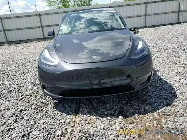 11 Photograph of a damaged car 7SAYGDED7RF042491 TESLA MODEL Y 2024
