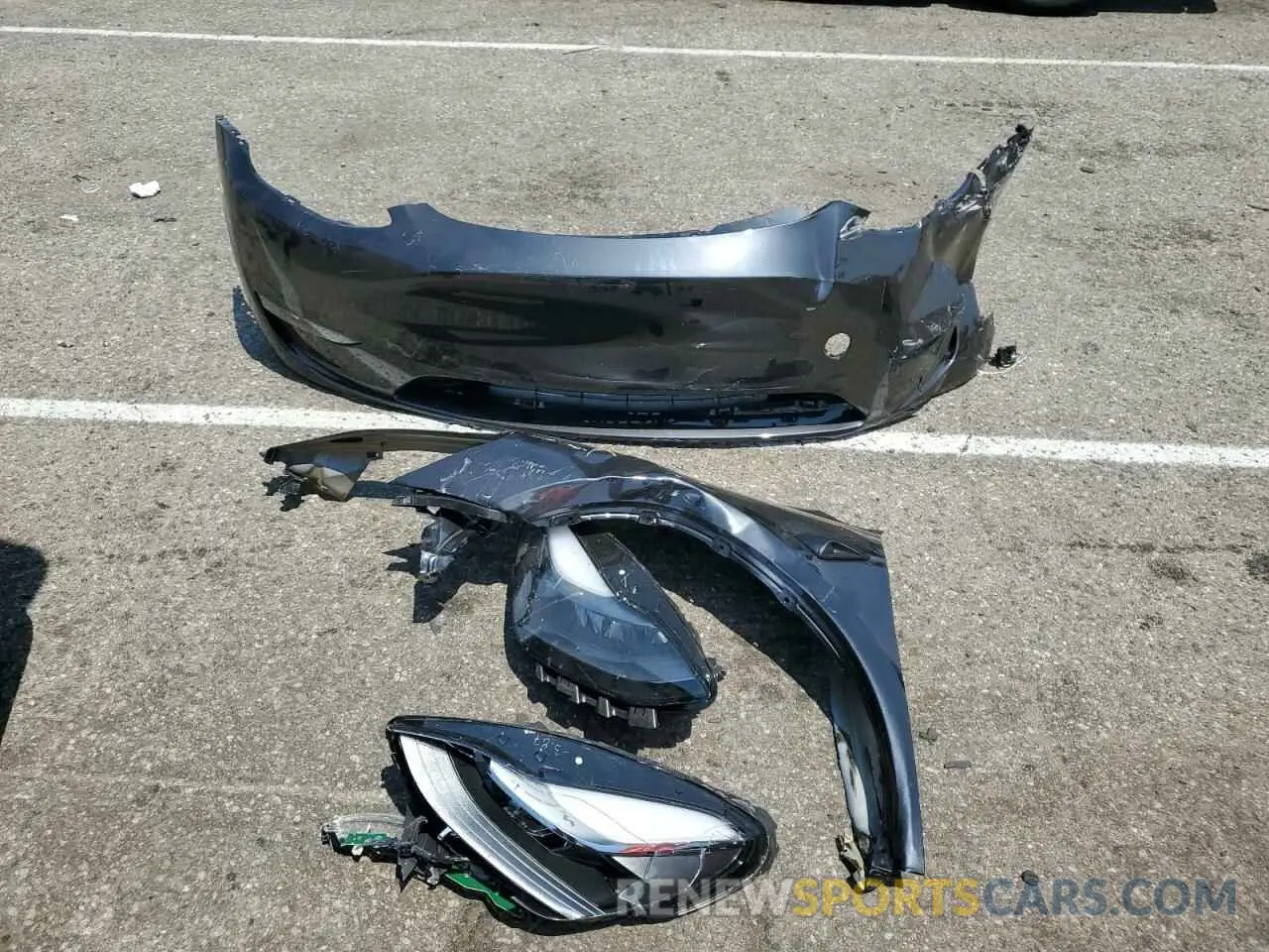 12 Photograph of a damaged car 7SAYGDED7RF054334 TESLA MODEL Y 2024