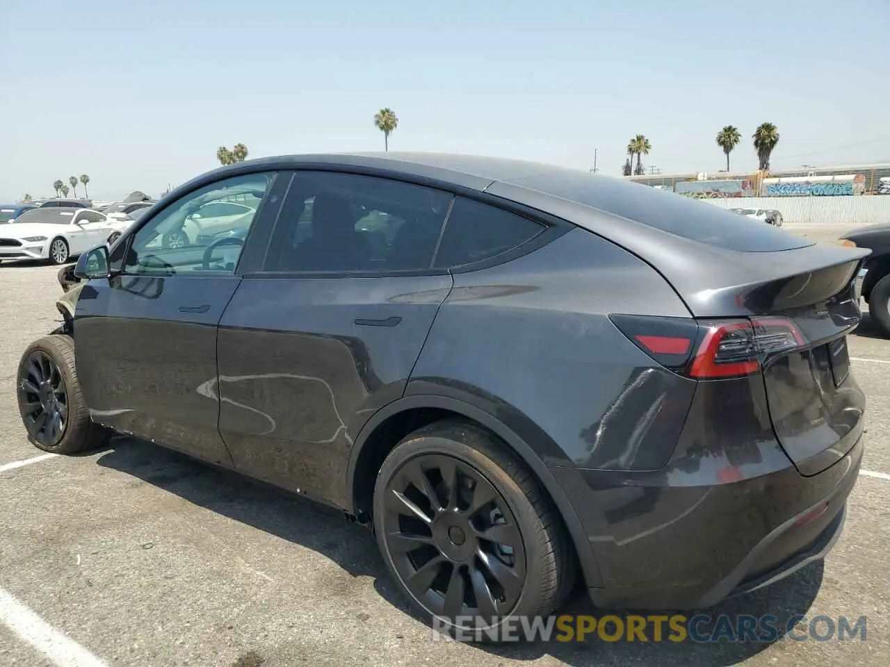 2 Photograph of a damaged car 7SAYGDED7RF054334 TESLA MODEL Y 2024