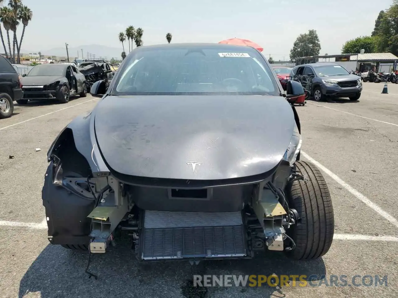 5 Photograph of a damaged car 7SAYGDED7RF054334 TESLA MODEL Y 2024
