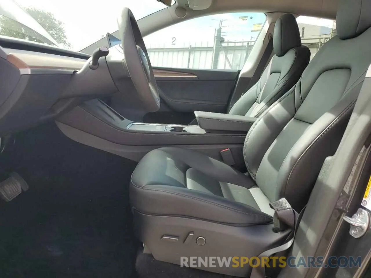 7 Photograph of a damaged car 7SAYGDED7RF099743 TESLA MODEL Y 2024