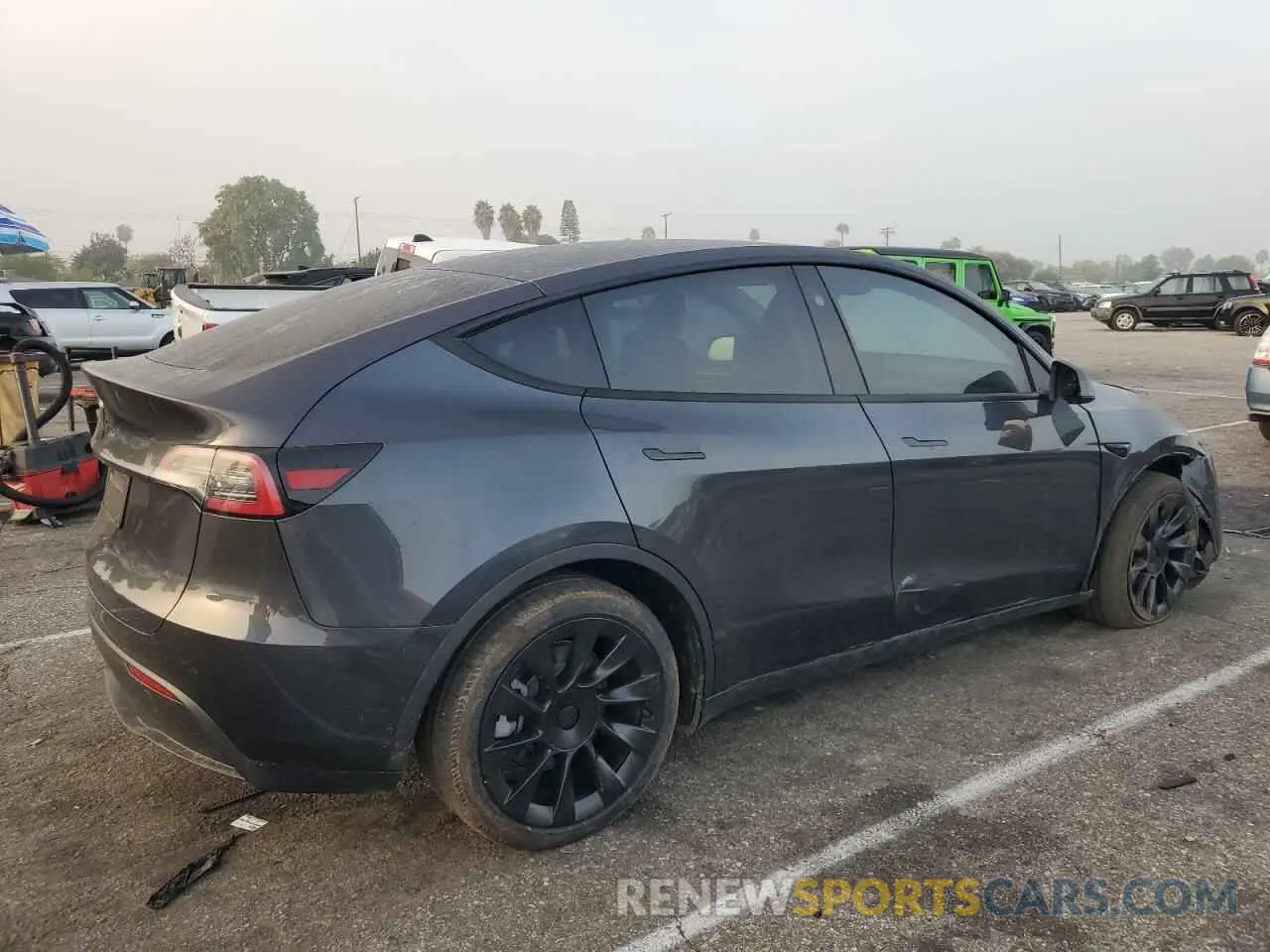 3 Photograph of a damaged car 7SAYGDED7RF103600 TESLA MODEL Y 2024