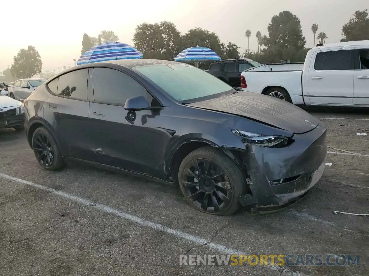 4 Photograph of a damaged car 7SAYGDED7RF103600 TESLA MODEL Y 2024