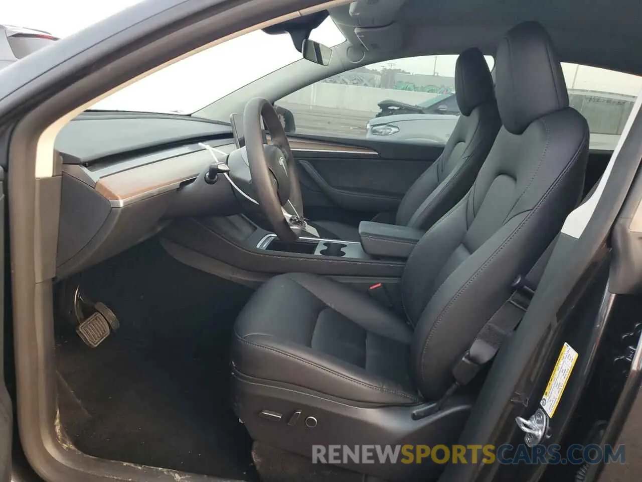 7 Photograph of a damaged car 7SAYGDED7RF103600 TESLA MODEL Y 2024