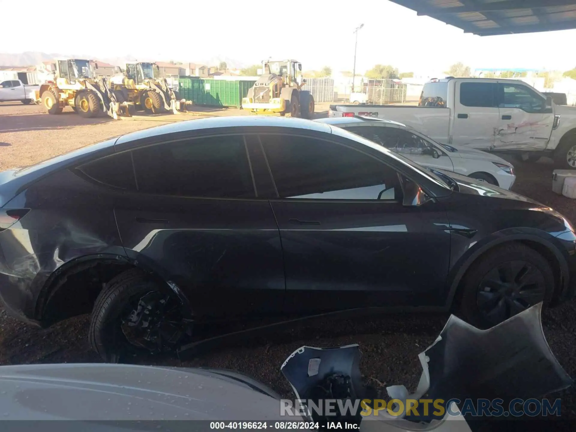 12 Photograph of a damaged car 7SAYGDED7RF108473 TESLA MODEL Y 2024
