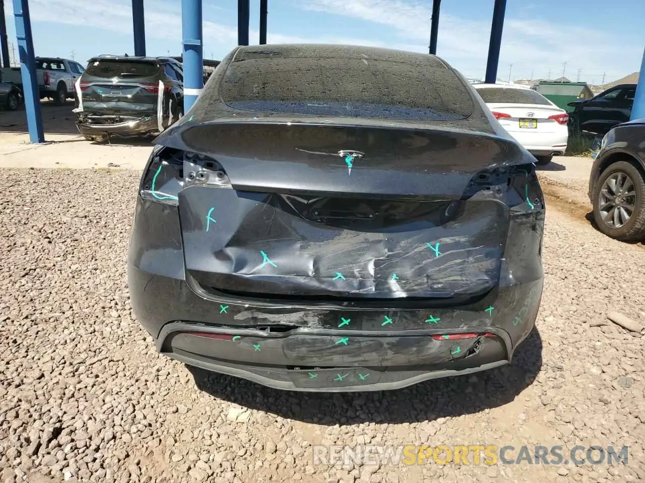 6 Photograph of a damaged car 7SAYGDED7RF119733 TESLA MODEL Y 2024