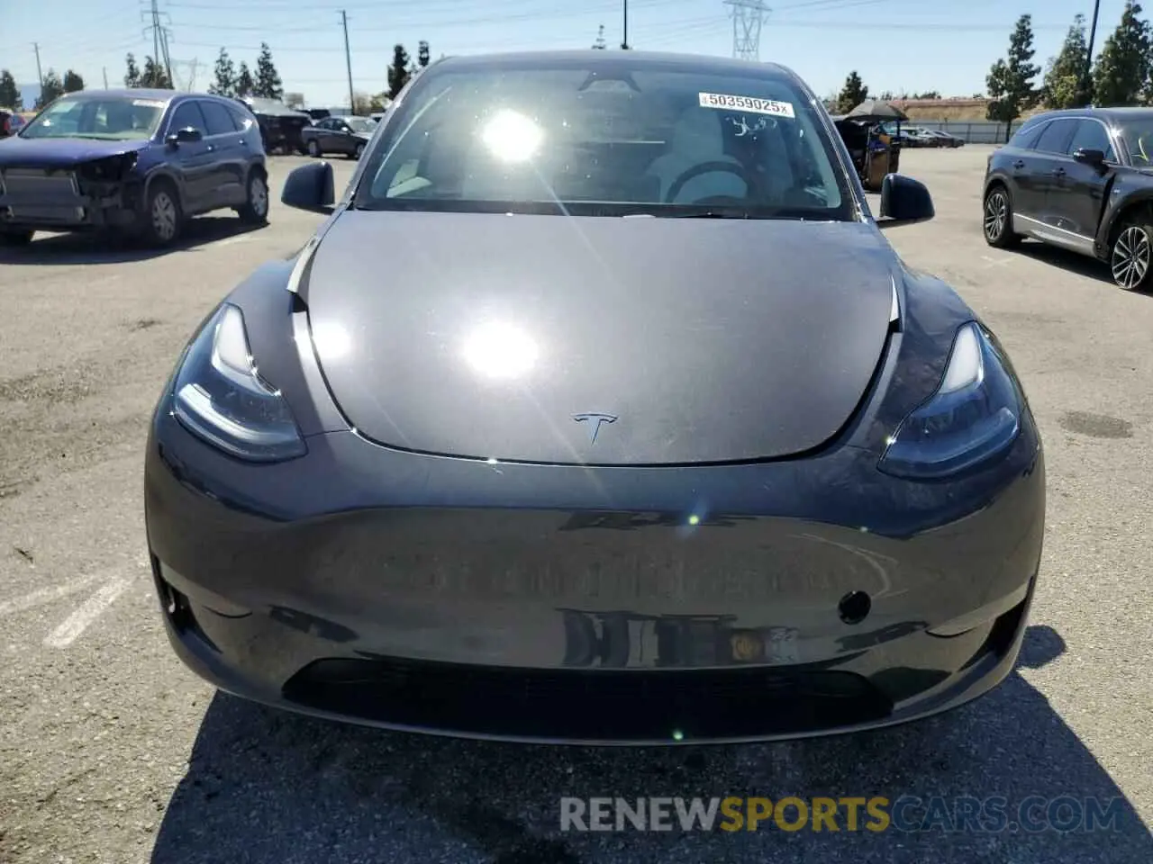 5 Photograph of a damaged car 7SAYGDED7RF199485 TESLA MODEL Y 2024