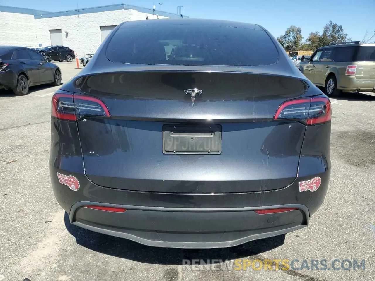 6 Photograph of a damaged car 7SAYGDED7RF199485 TESLA MODEL Y 2024