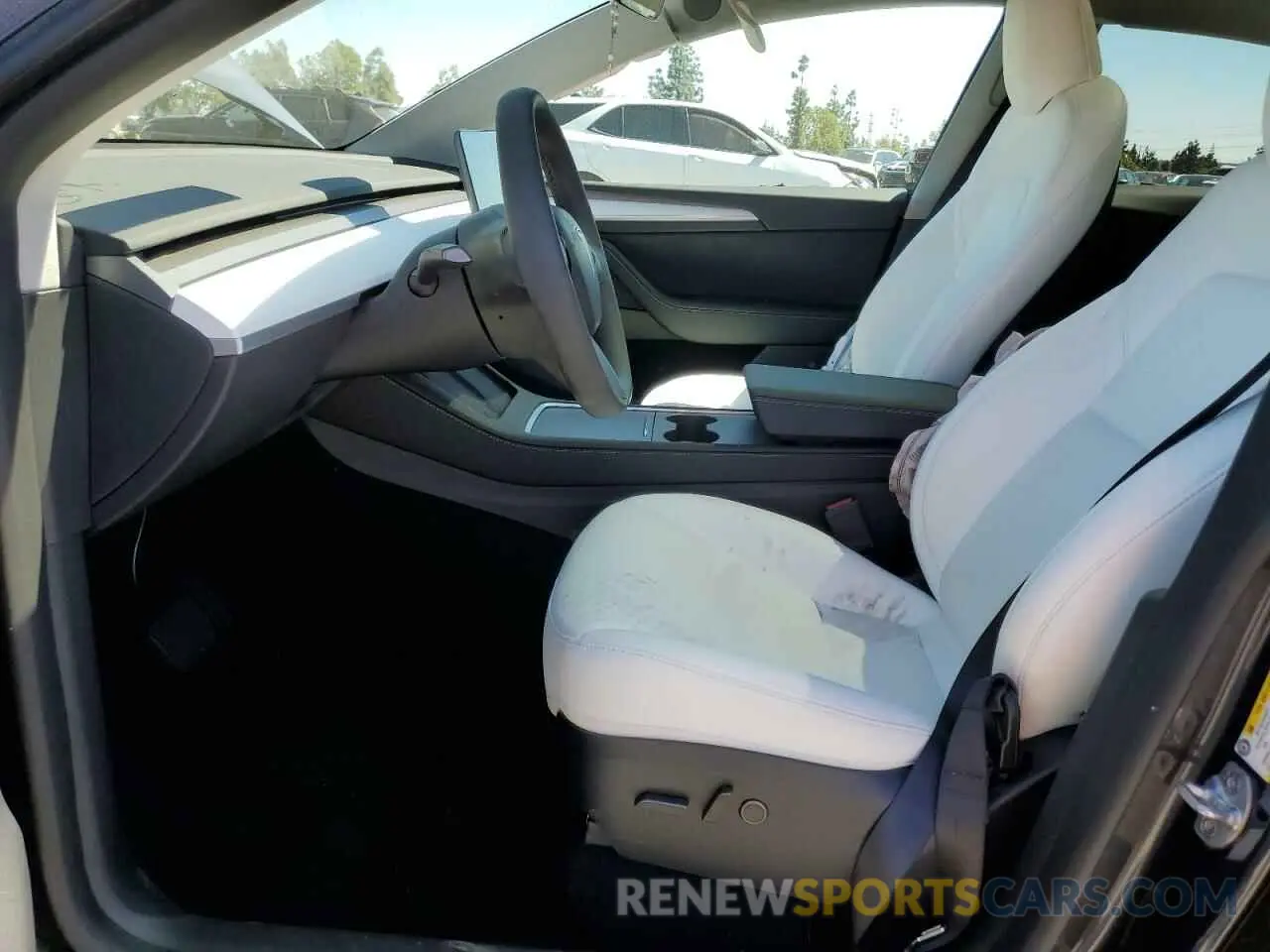 7 Photograph of a damaged car 7SAYGDED7RF199485 TESLA MODEL Y 2024