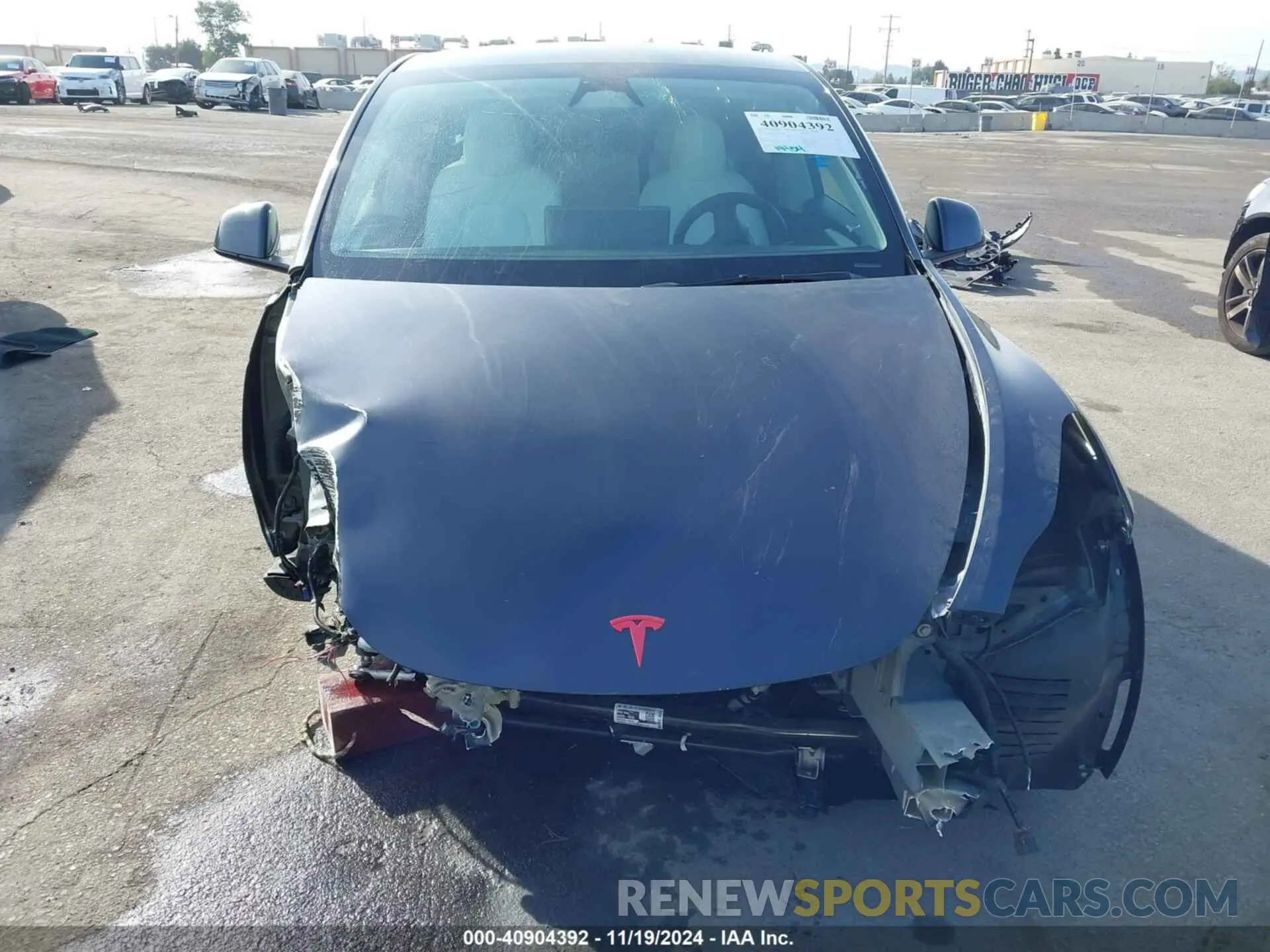 12 Photograph of a damaged car 7SAYGDED8RF008642 TESLA MODEL Y 2024