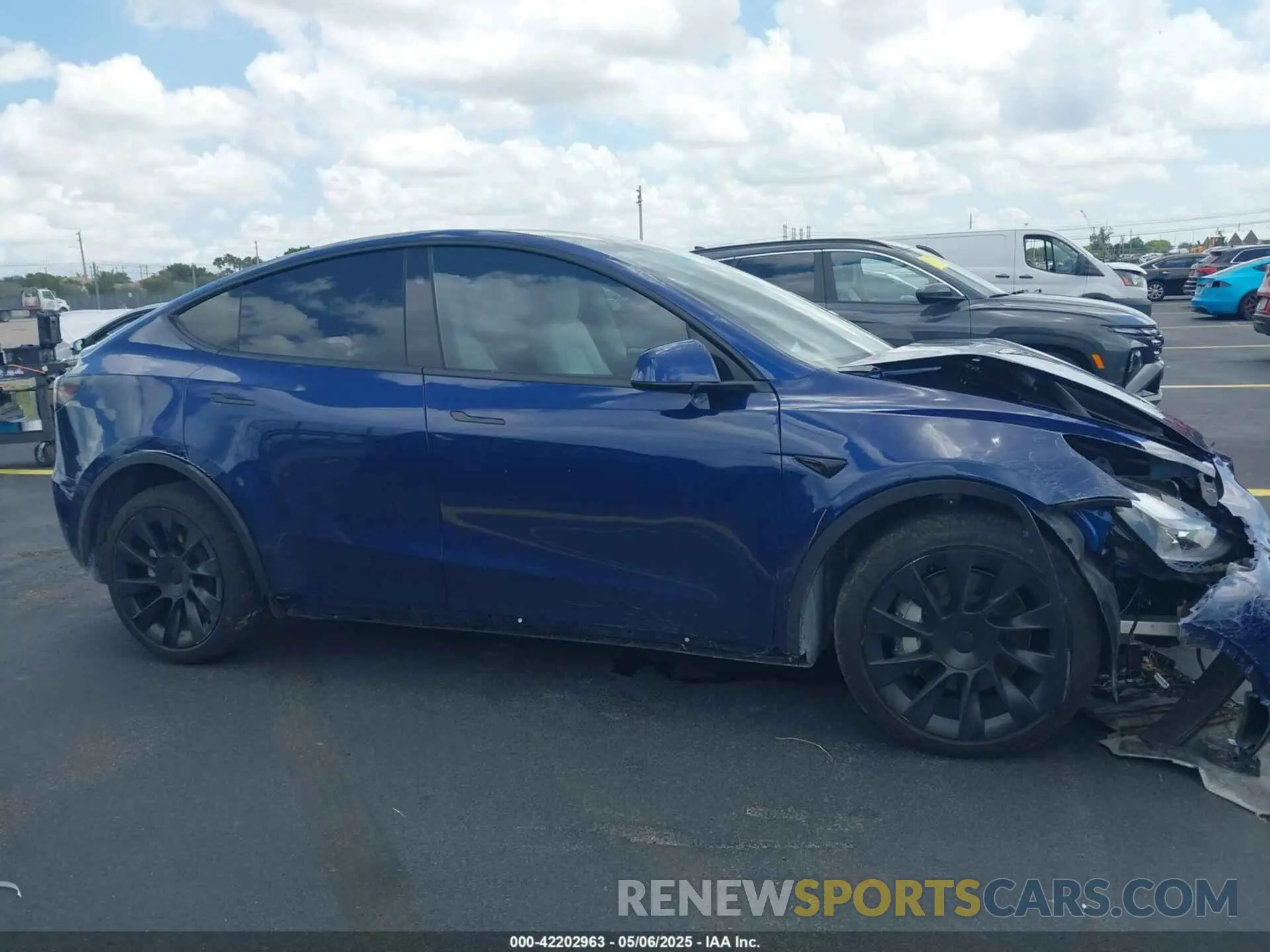 13 Photograph of a damaged car 7SAYGDED8RF015882 TESLA MODEL Y 2024
