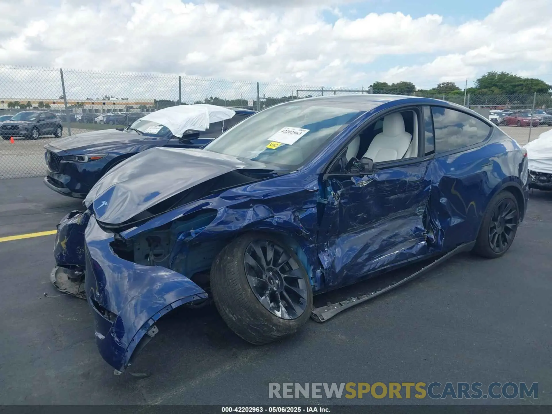 2 Photograph of a damaged car 7SAYGDED8RF015882 TESLA MODEL Y 2024