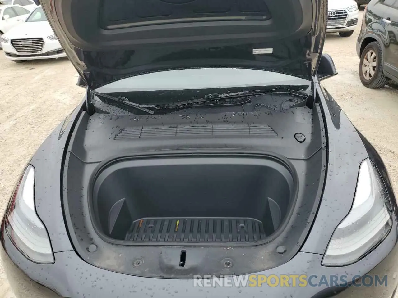 11 Photograph of a damaged car 7SAYGDED8RF074608 TESLA MODEL Y 2024