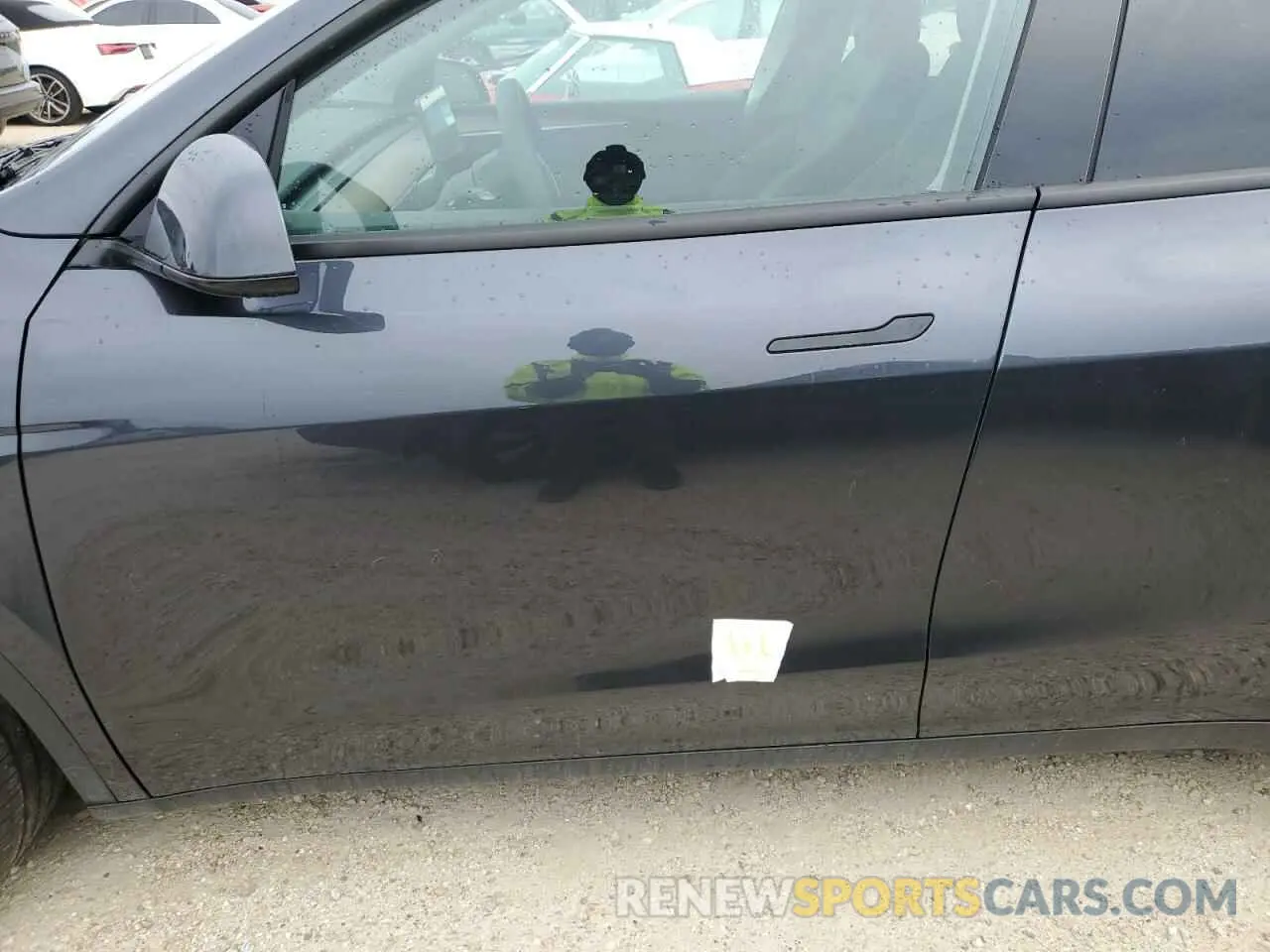 7 Photograph of a damaged car 7SAYGDED8RF074608 TESLA MODEL Y 2024