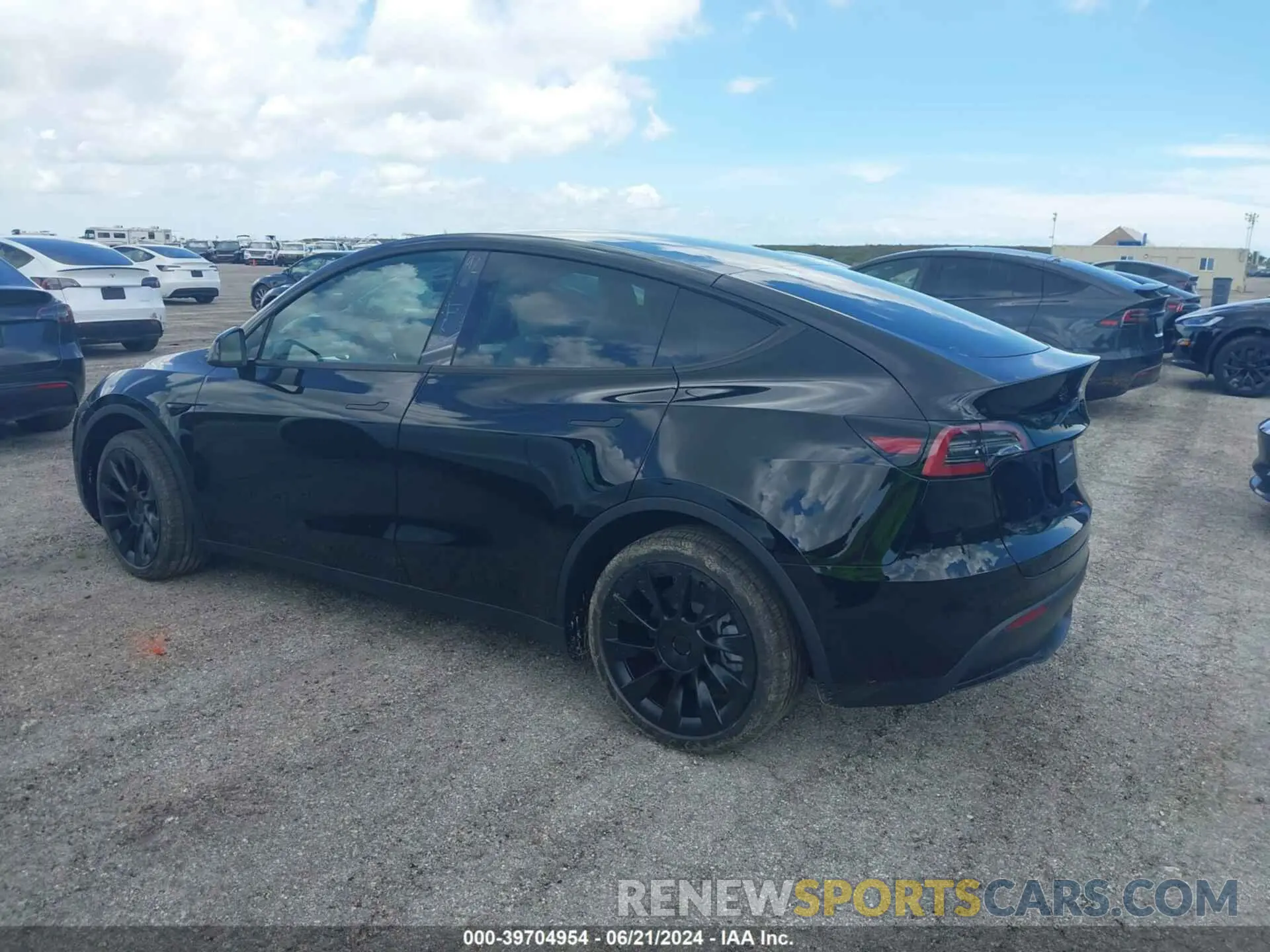 3 Photograph of a damaged car 7SAYGDED8RF092915 TESLA MODEL Y 2024