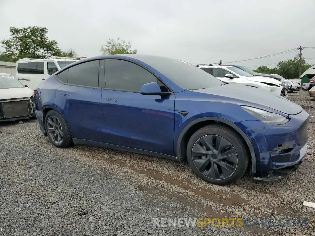 4 Photograph of a damaged car 7SAYGDED8RF096074 TESLA MODEL Y 2024