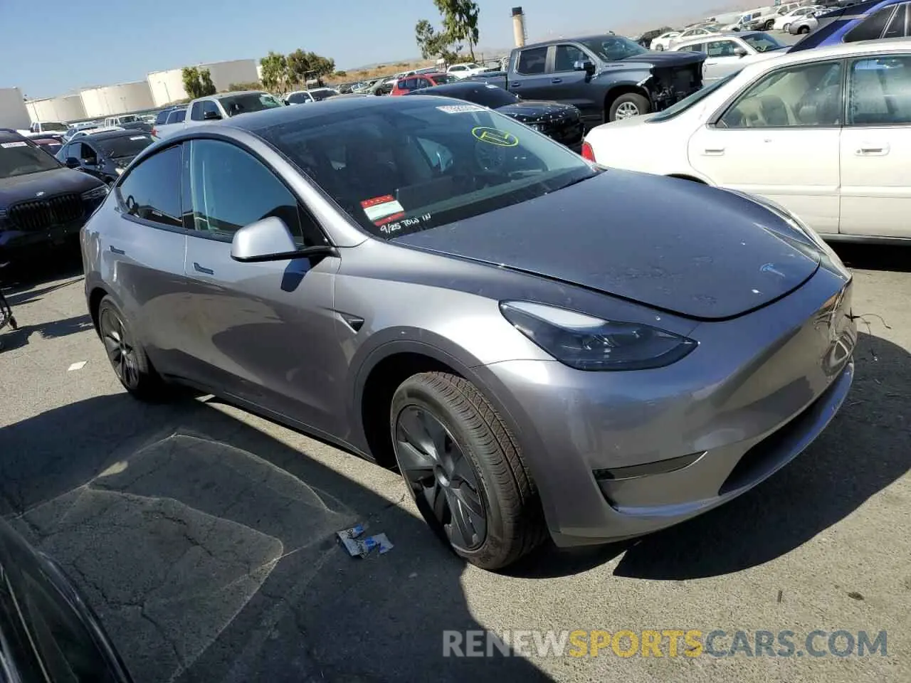 4 Photograph of a damaged car 7SAYGDED8RF195669 TESLA MODEL Y 2024