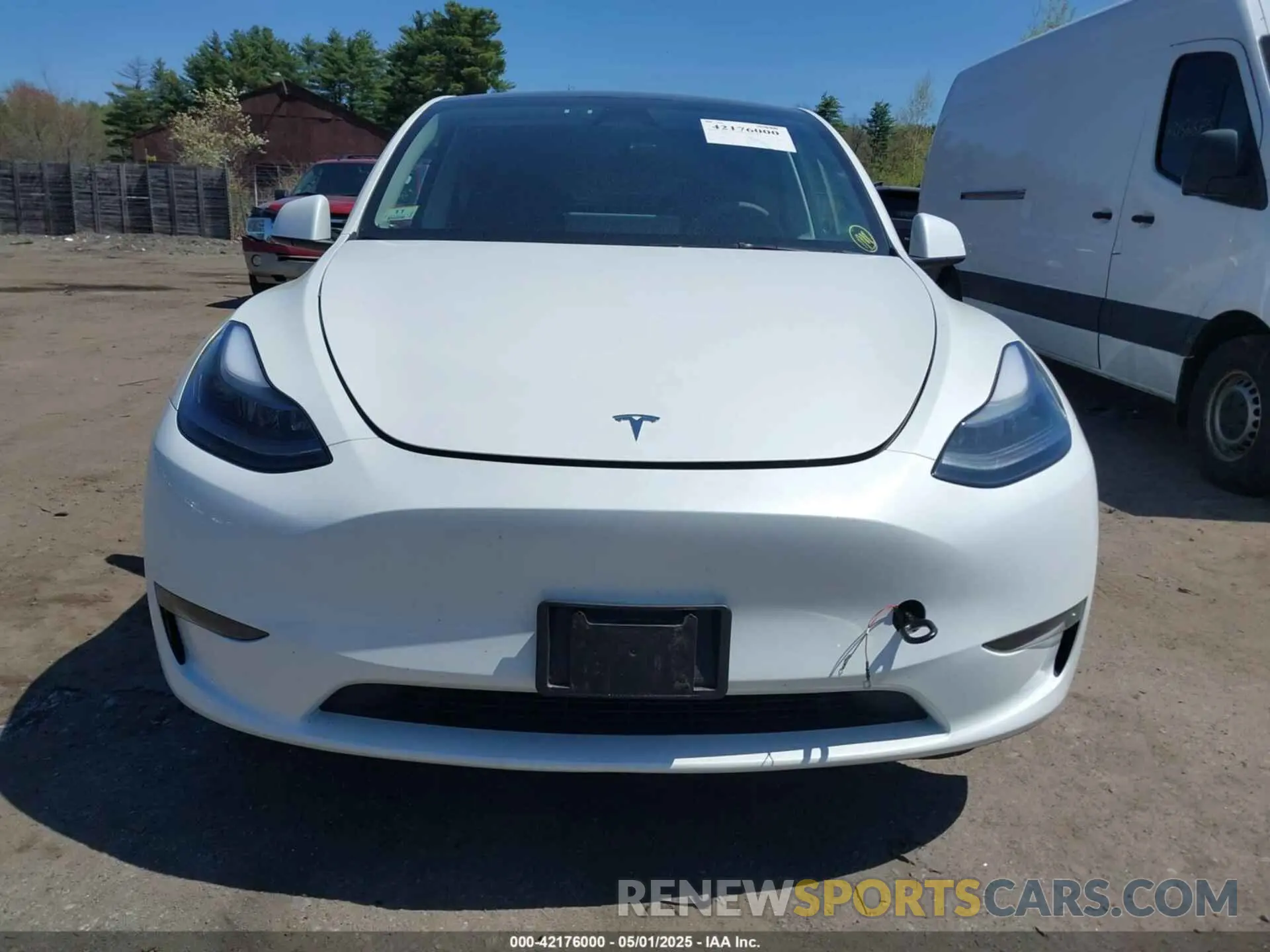 6 Photograph of a damaged car 7SAYGDED8RF211112 TESLA MODEL Y 2024