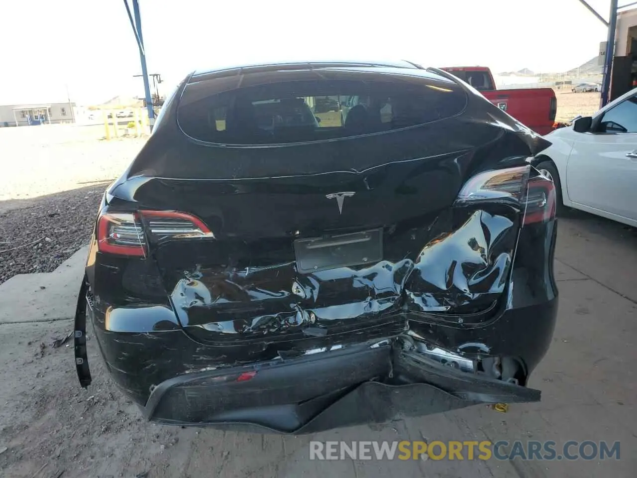 6 Photograph of a damaged car 7SAYGDED9RF019035 TESLA MODEL Y 2024