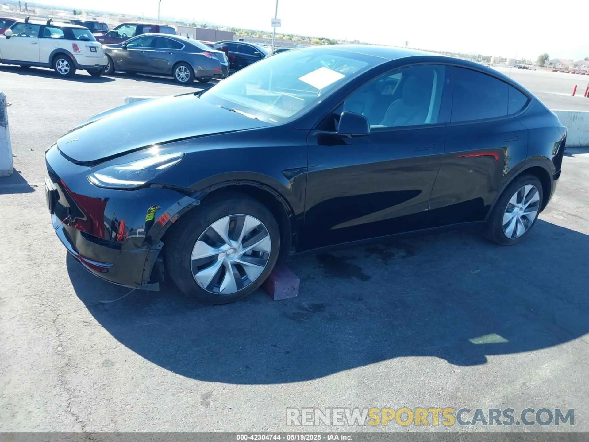 6 Photograph of a damaged car 7SAYGDED9RF093975 TESLA MODEL Y 2024
