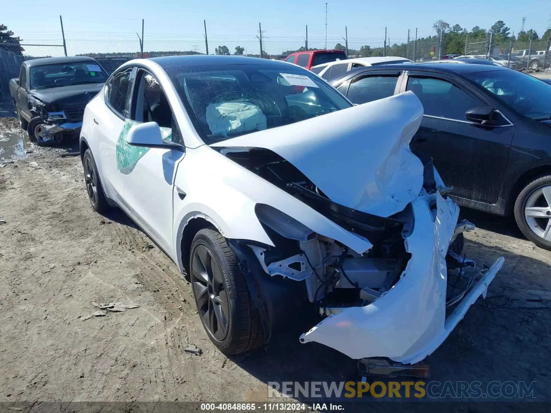 1 Photograph of a damaged car 7SAYGDEDXRF111707 TESLA MODEL Y 2024